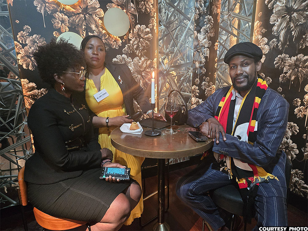 From left, Vellinia Muhereza of Streams Safaris interacts with High Commission's Patricia Kente and Uganda West Australia Community president Geoffrey Gumikiriza