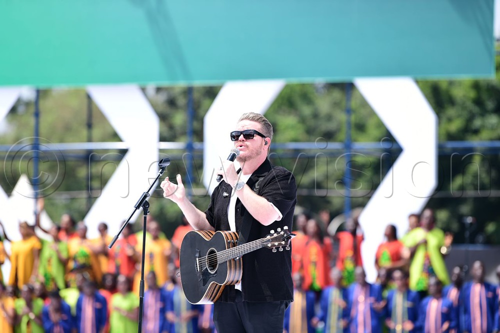 Worship leader BJ Putnam leads worship at at the Watoto Church Big 40 celebrations.