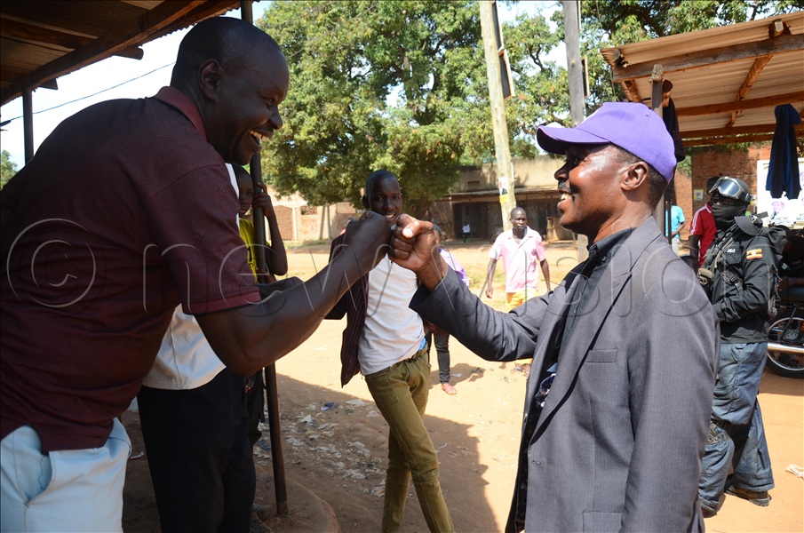 One of the locals welcoming Maj Gen rtd Mugisha Muntu in Butebo town council, Butebo district. (Credit: Isaac Nuwagaba)