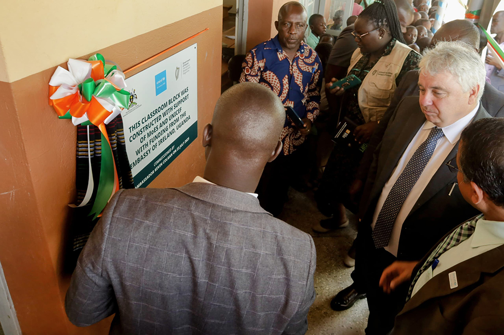 Irish Ambassador to Uganda, H.E. Kevin Colgan cutting the ribbon for the new block. (Courtesy)