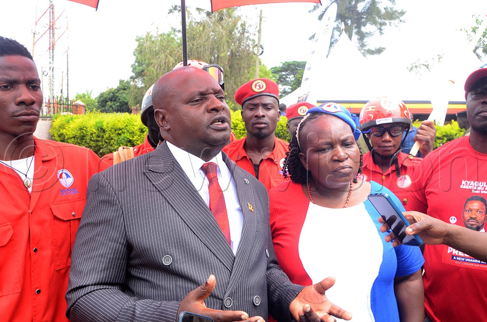 Bright Muhumuza of NUP (In red necktie) was nominated to contest for Mbarara City South MP seat. (Photo by Fred Turyakira)
