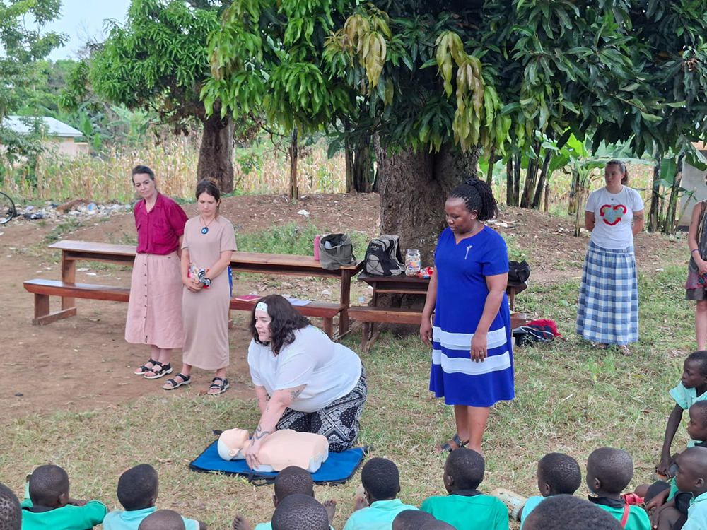 Visiting experts demonstrating to Manafwa pupils how CPR is performed.