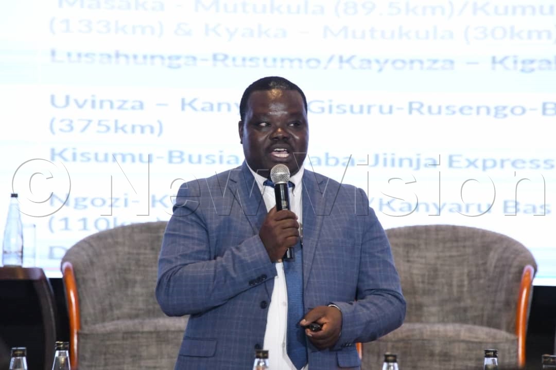 Godfrey Enzama, Principal Civil Engineer, makes a presentation. (Credit: Mpalanyi Ssentongo)