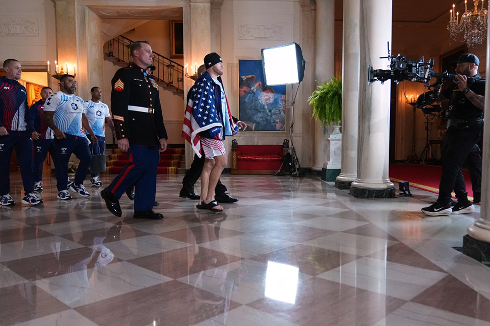 America's mixed martial artist Justin Gaethje walks through the Grand Foyer of the White House before his lightweight title bout with Georgia-Spain's mixed martial artist Ilia Topuria, during UFC Freedom 250 on the South Lawn of the White House, in Washington, DC, on June 15, 2026. (AFP)