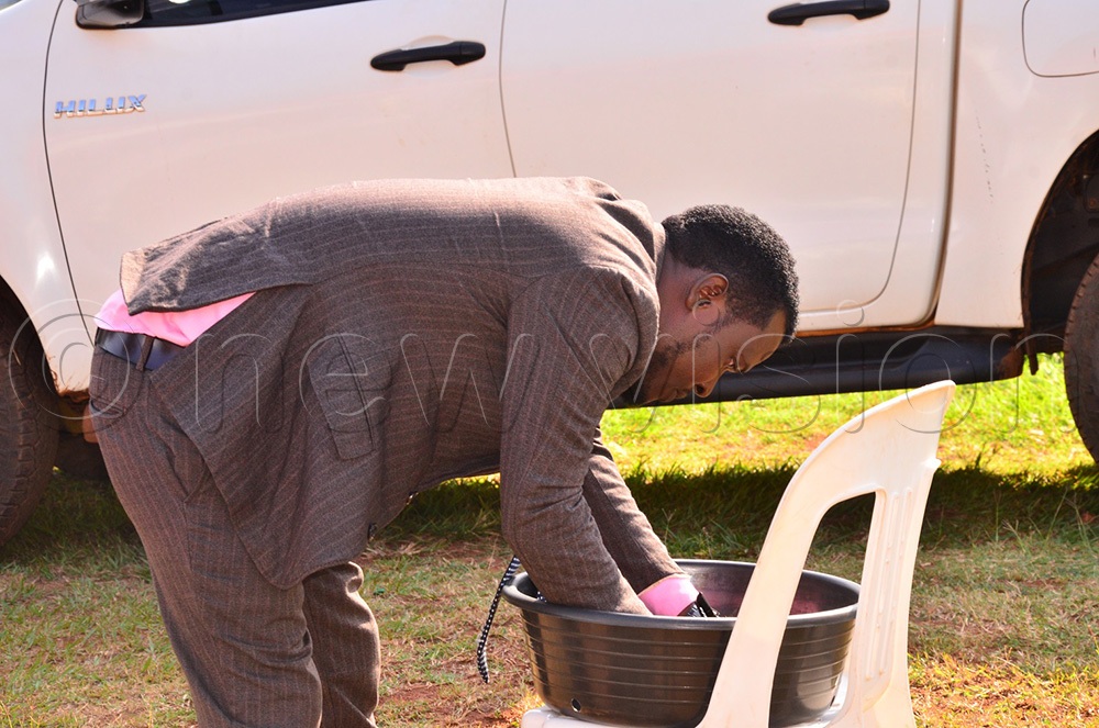 Mansoor Ssemuwemba, one of the candidates in the speakership race, participating in the voting process at the Bugembe division offices on Friday, July 3, 2026. (Photo by Jackie Nambogga)