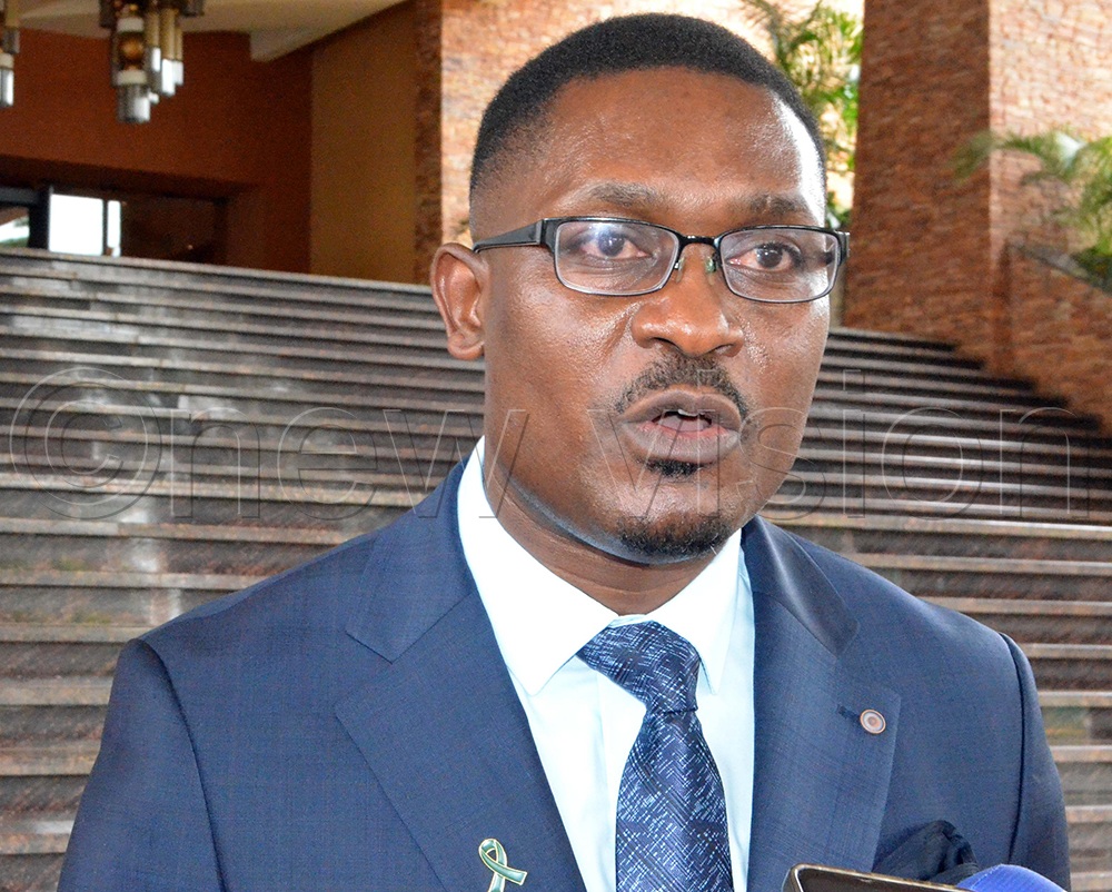 StrongMinds Uganda Country Director Vincent Mujune speaks during the Second East African Mental Health Summit at Speke Resort Munyonyo. (Photo by Violet Nabatanzi).