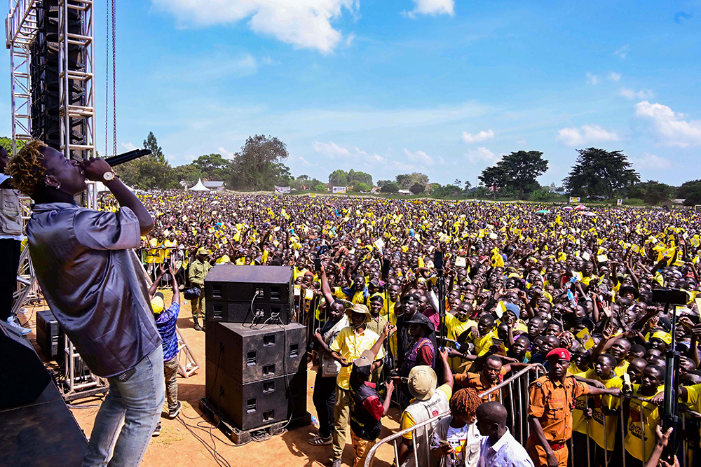 Musician Gravity Omutujju entertains NRM supporters during President Museveni's campaign rally in Agule in Pallisa district on Wednesday, November 12, 2025. (PPU Photo)