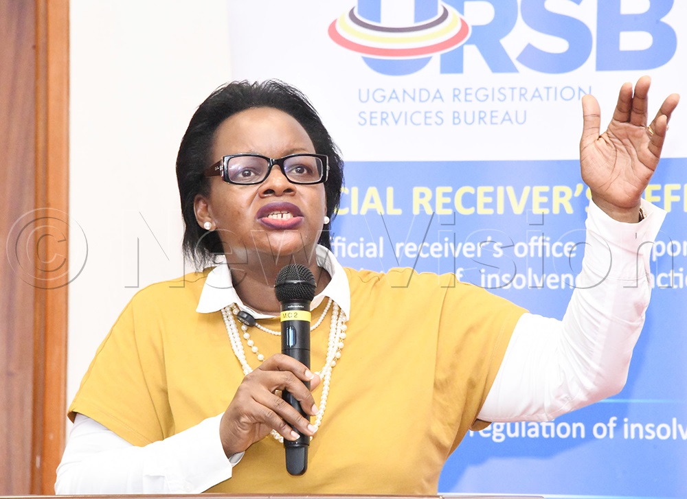 The Registrar General of Uganda Registration Services Bureau, Mercy Kainobwisho, addressing a congregation of Young business People on the Business Rescue and Aftercare Program at Uganda Business Facilitation Centre (UBFC) auditorium on Monday, September 29, 2025. (Photo by Mpalanyi Ssentongo)