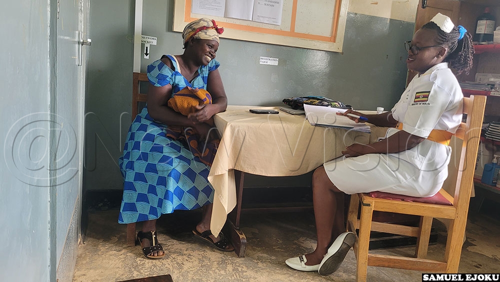 Sister Rachael Adong (R) getting the sickness history of a woman who came for cervical cancer screening at Soroti Regional Referral Hospital