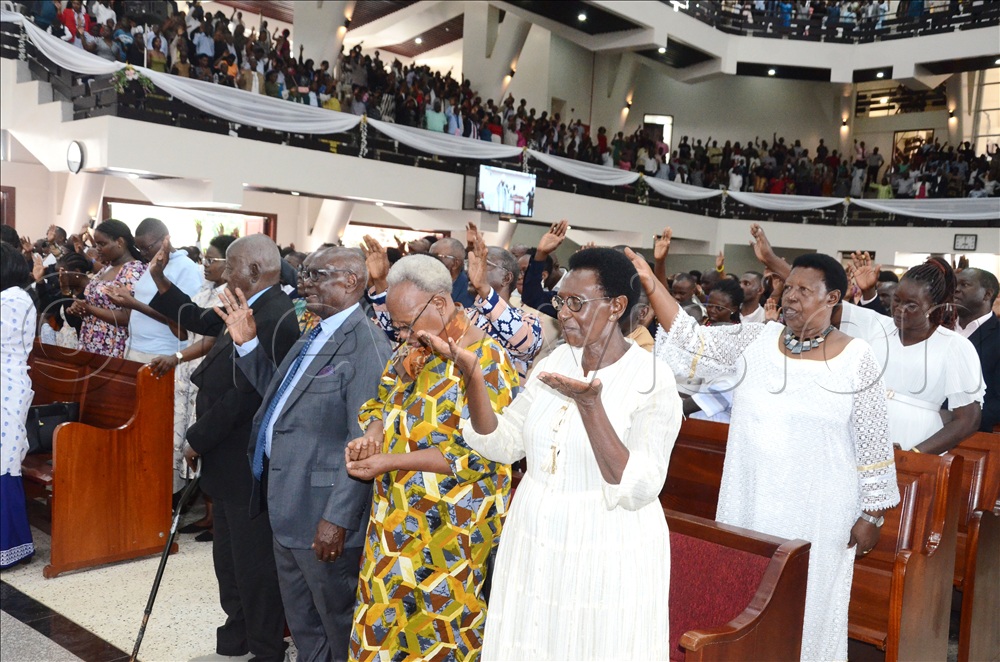 The faithful participating in praise and worship during the Easter Sunday Service at All Saints Cathedral Nakasero Kampala on April 5, 2026.