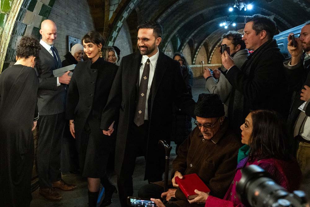 New York mayor Zohran Mamdani (C) walks with his wife Rama Duwaji pass his parents Mira Nair (R) and Mahmood Mamdani (2-R) after being sworn in on January 1, 2026 in New York. (Credit: AFP)