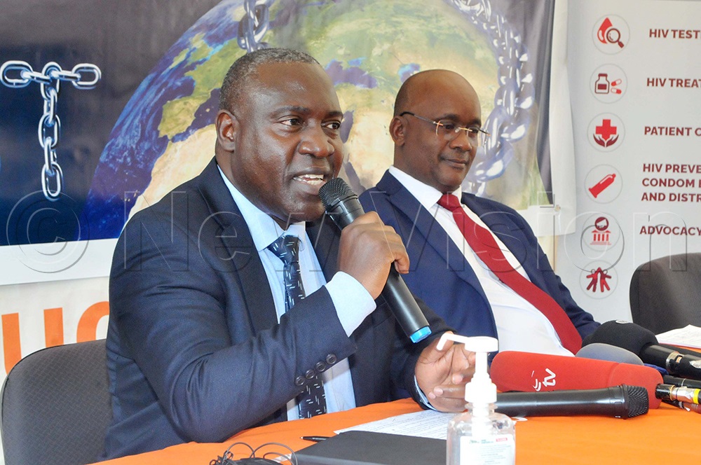 Henry Magala (left) the Country Program Manager AIDS Healthcare Foundation speaks as Julius Mukunda the Executive Director Civil Society Budget Advocacy Group (CSBAG) looks on during a media launch for the Freedom from Debt Campaign on June 10, 2026. (Photo by Nicholas Oneal)
