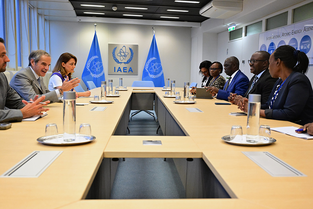 Uganda's delegation led by PS Bagiire at a meeting with the International Atomic Energy Agency boss . July 21st  2025 , Vienna.