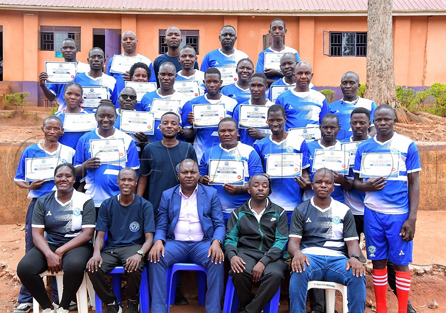 Khokho Uganda Level One coaching course graduates at Mukono East Primary School, August 20, 2026, with their certificates. Photo: Silvano Kibuuka