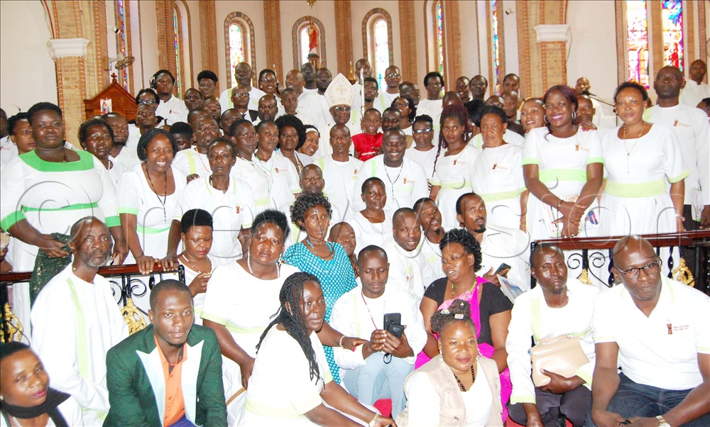 Catholic communicators share a group photo-moment with Archbishop Paul Ssemogerere (wearing a mitre) during the commemoration of the 60th World Social Communications Day at Lubaga Cathedral on Sunday, May 17, 2026.