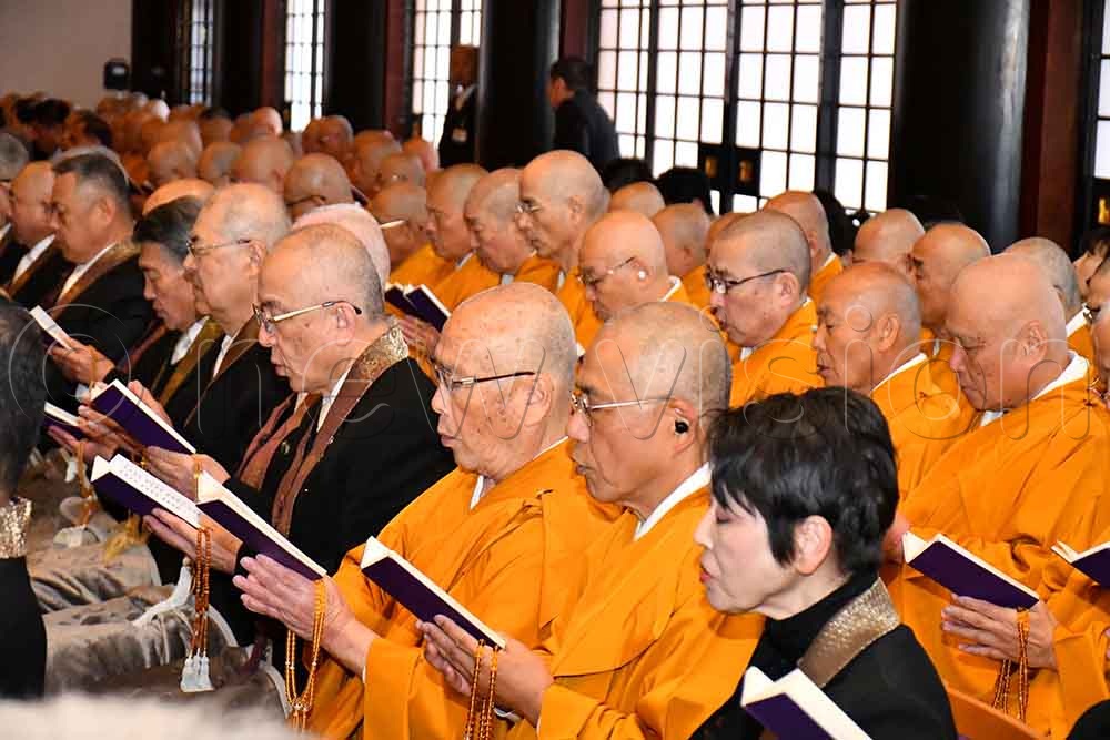 Monks performing the chanting of the Suntra at the Royal Grand Hall of Buddhism in Nenbutsushu Sampozan Muryojuji Head Temple during celebrations to mark the International Buddhist Day. (Credit: Donald Kiirya)