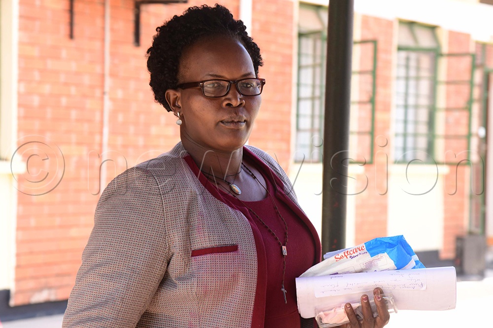 Suzan Vivian Ariokot, the wife of Joseph Okedi, who a witness accused of killing the child using a cutter knife. (Photo by Godfrey Ojore)