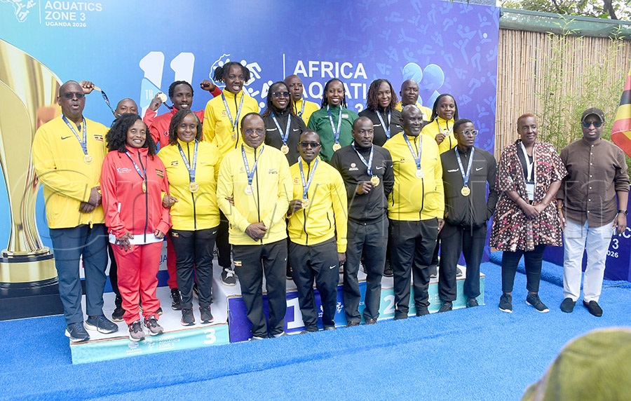 Some of swimming masters gold medalists pose with their medals at KISU. Photo by Michael Nsubuga