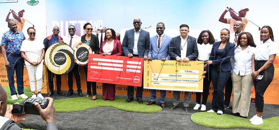 Andrew Kilonzo (centre) the Managing Director at UBL, Uganda Golf Union- President Jackson Were (7th right) Uganda Tourism Board CEO Juliana Kaggwa (5th left) and Absa’s Head of Global Corporates, Judith Bulamu (6th left) pose with the rest of the other partners during the launch of the Uganda Open at UBL headquarters.  Photo by Michael Nsubuga