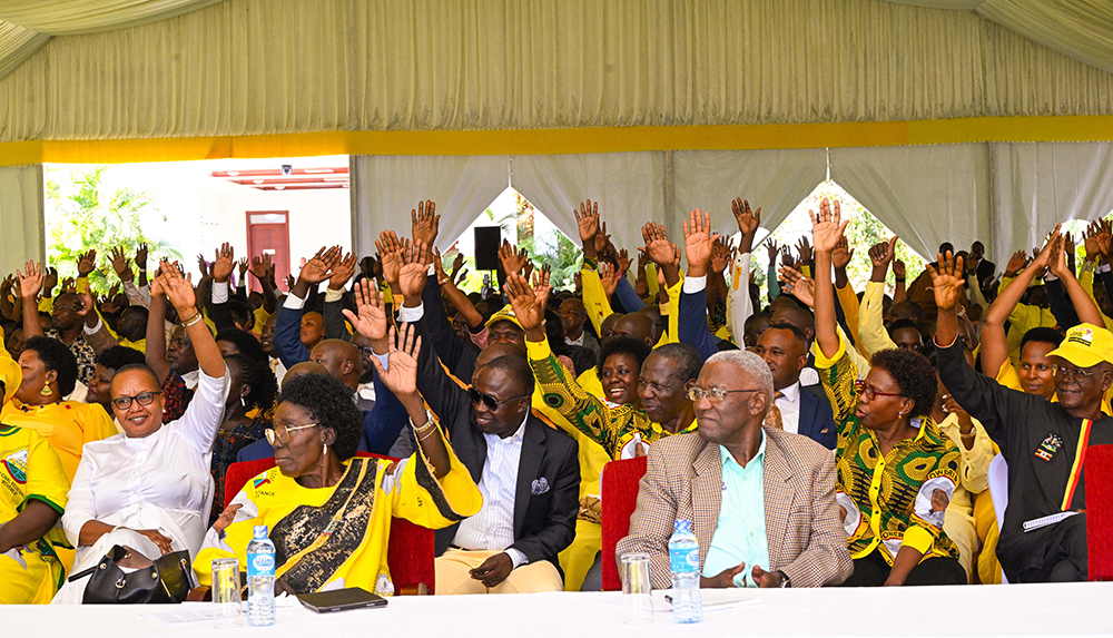NRM Members of Parliament raise their hands as they endorsed Hon Jacob Oboth Oboth and Hon Thomas Tayebwa as the party candidates for position of Speaker and Deputy Speaker of the 12th Parliament.