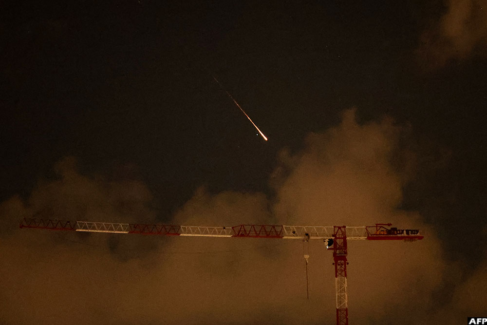 Israel's military issued two warnings in quick succession early Wednesday that Iran had fired missiles toward it, moments after US President Donald Trump said he had agreed to postpone striking Iranian infrastructure