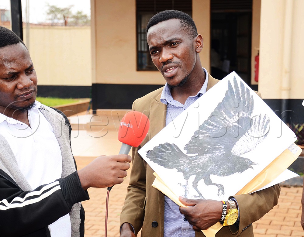 Disan Kagumaho, an independent candidate addressing media on his presidential ambitions at the EC headquarters in Kampala (Photo by Isaac Nuwagaba)