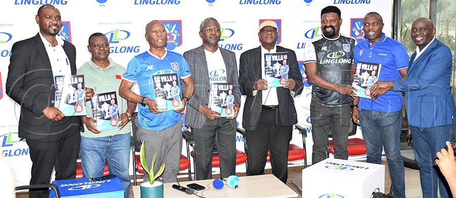 Villa Spokesperson Asan Kasingye (3rd left), CEO William Nkemba (4th left)  assistant CEO Sulaiman Mutajazi (left), executive member Salim Ssemmanda (2nd left), founder Guy Kawuma (4th right), Dennis Mbidde, and Herbert Bashasha and Fred Kaweesi (right) display copies of the magazine at a press conference held at Mandela Auto Zone in Industrial Area. Photo by Michael Nsubuga