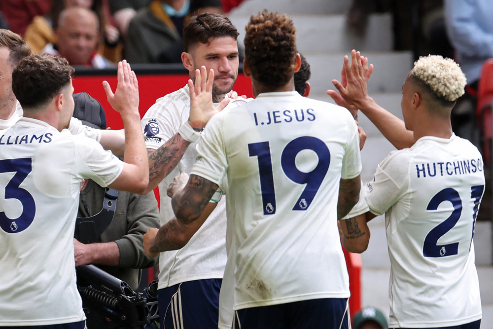 Nottingham Forest's Brazilian defender #04 Morato (C) celebrates with teammates after scoring their first goal during the English Premier League football match between Manchester United and Nottingham Forest at Old Trafford in Manchester, north west England, on May 17, 2026. 