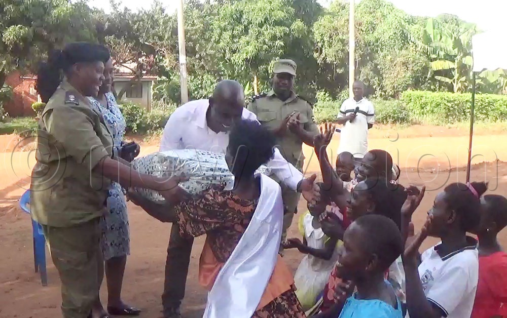 The handover was witnessed by local leaders and residents, who celebrated the outcome. Neikesa's two-acre piece of land, together with its sugar cane plantation, had been forcefully seized by relatives of her late husband, James Batyamye, despite earlier interventions by local authorities. (Credit: Ivan Wakibi)