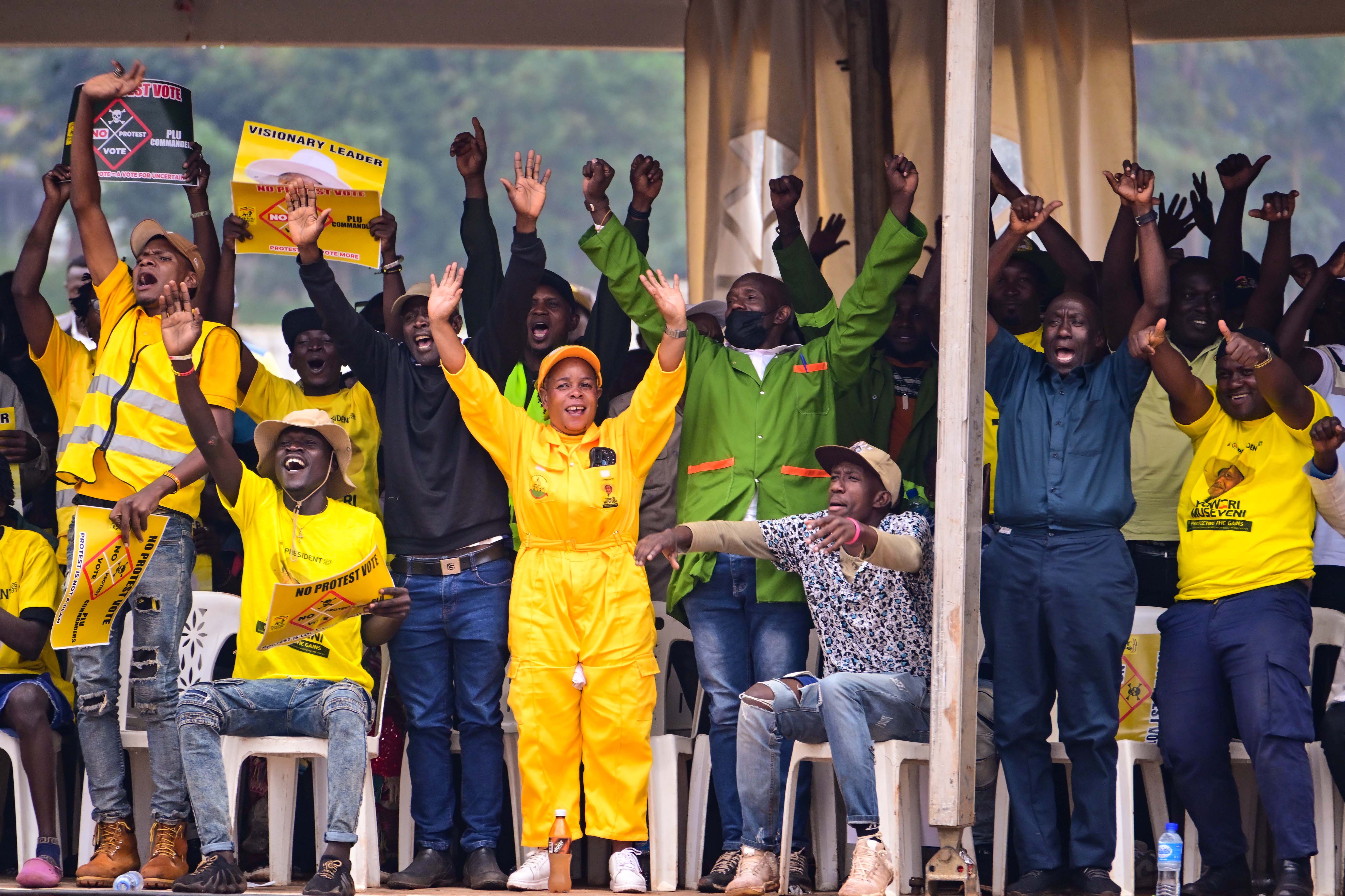 Some of the mechanics and garage operators from Kampala metropolitan region express their support for President Museveni during a meeting at Kololo on Sunday. 