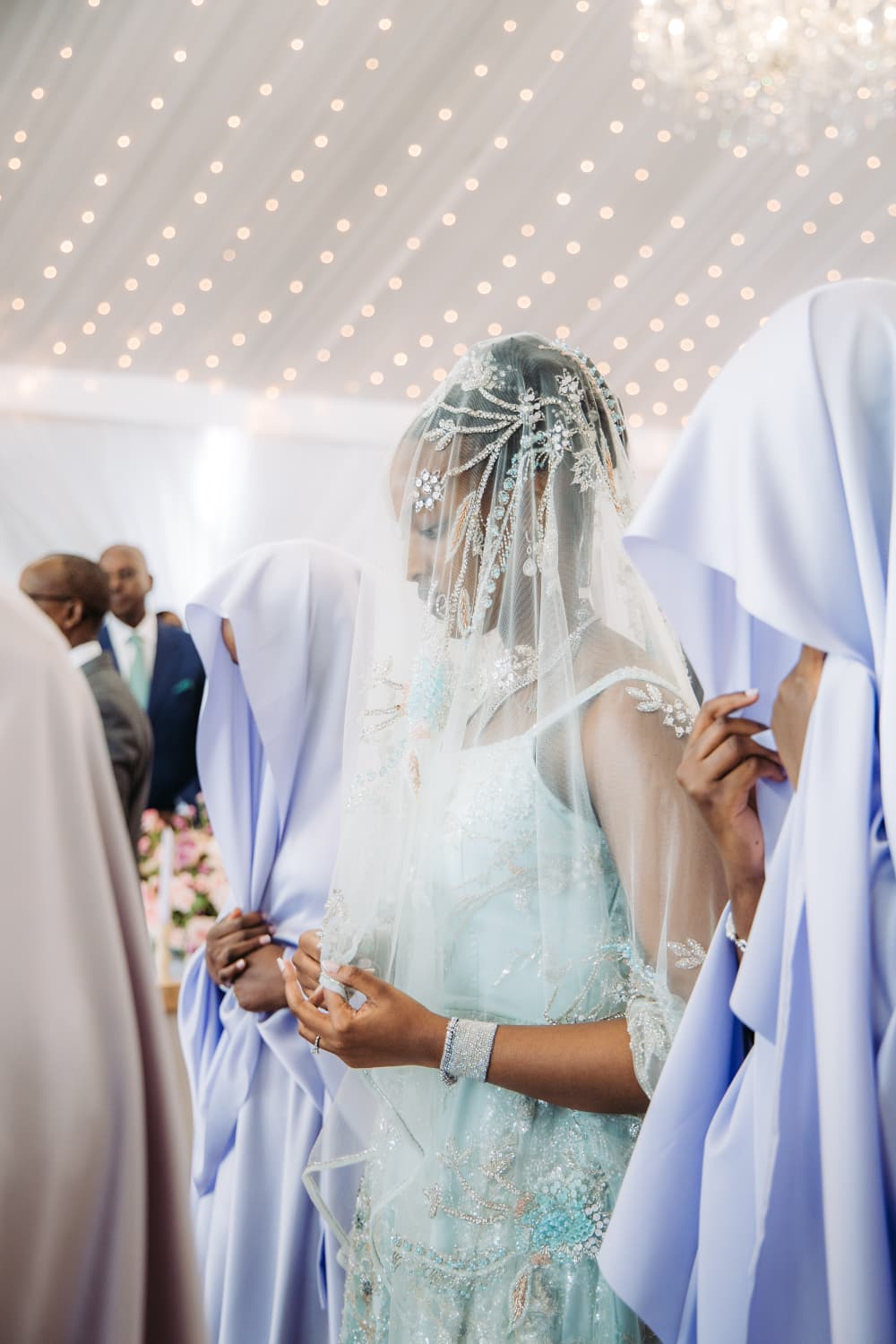 Here comes Nsasiirwe (centre), the bride.