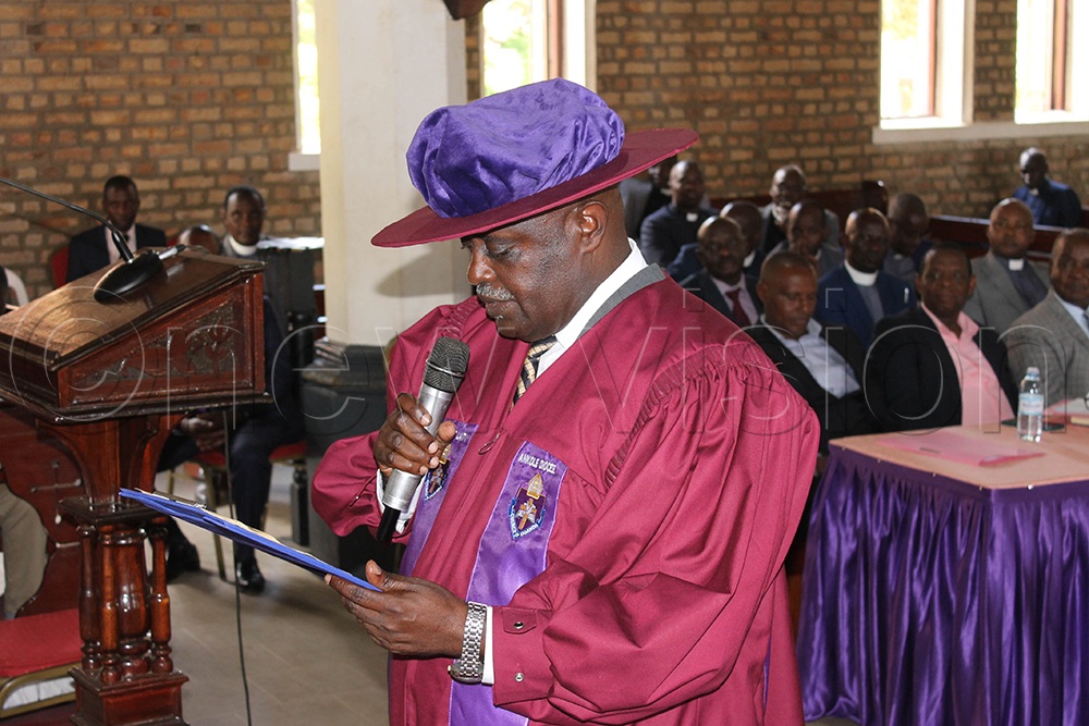 Notti Erickson Nabimanya takes the oath of office as the new head of laity of Ankole Diocese. (Photo by Abdulkarim Ssengendo)