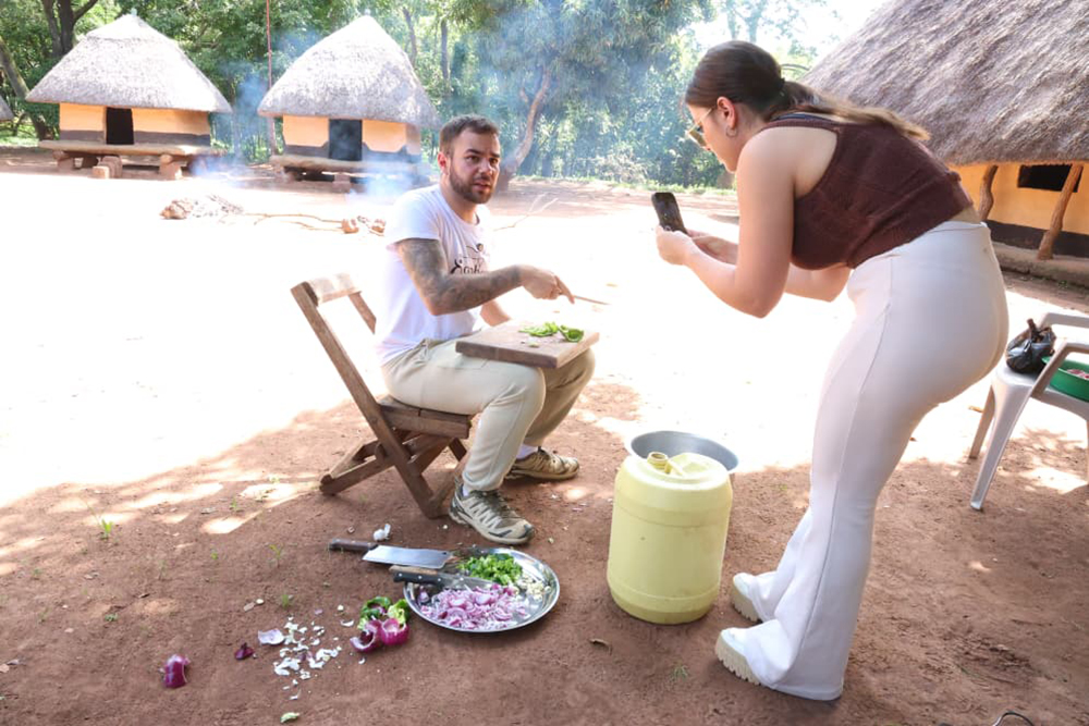 Tourists participate in preparing local dishes, engaging with communities, exploring cultural heritage sites and documenting their experiences through digital content. (Courtesy)