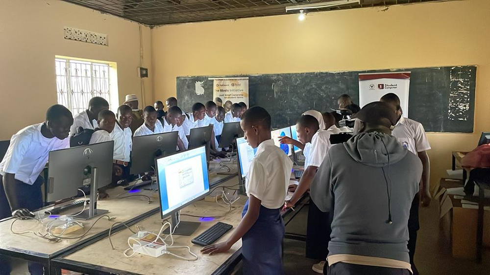 Students at Migyera UWESO Secondary School test donated computers from Maticent Industries. (Courtesy photo)