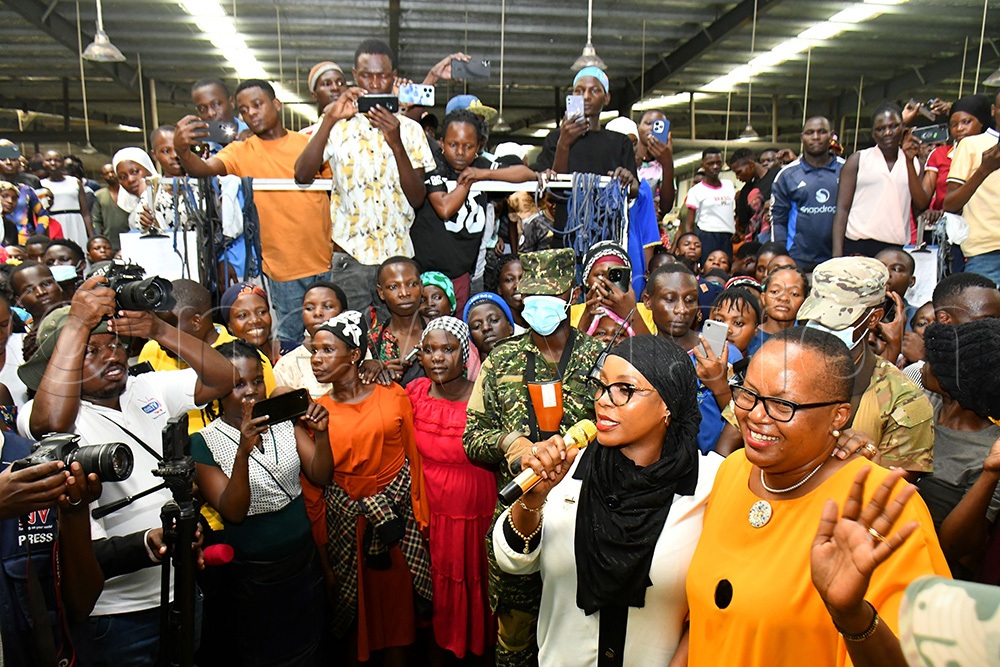 The State Minister for Privatisation and Investment, Hajjati Aminah Mukalazi (2nd right), addressing workers while in one of the textile factories at Sino-Uganda Mbale Industrial Park on August 26th. Looking on is Lydia Wanyoto (right), the State Minister of Public Service and also the Mbale City Woman MP. (Photo by Donald Kiirya)