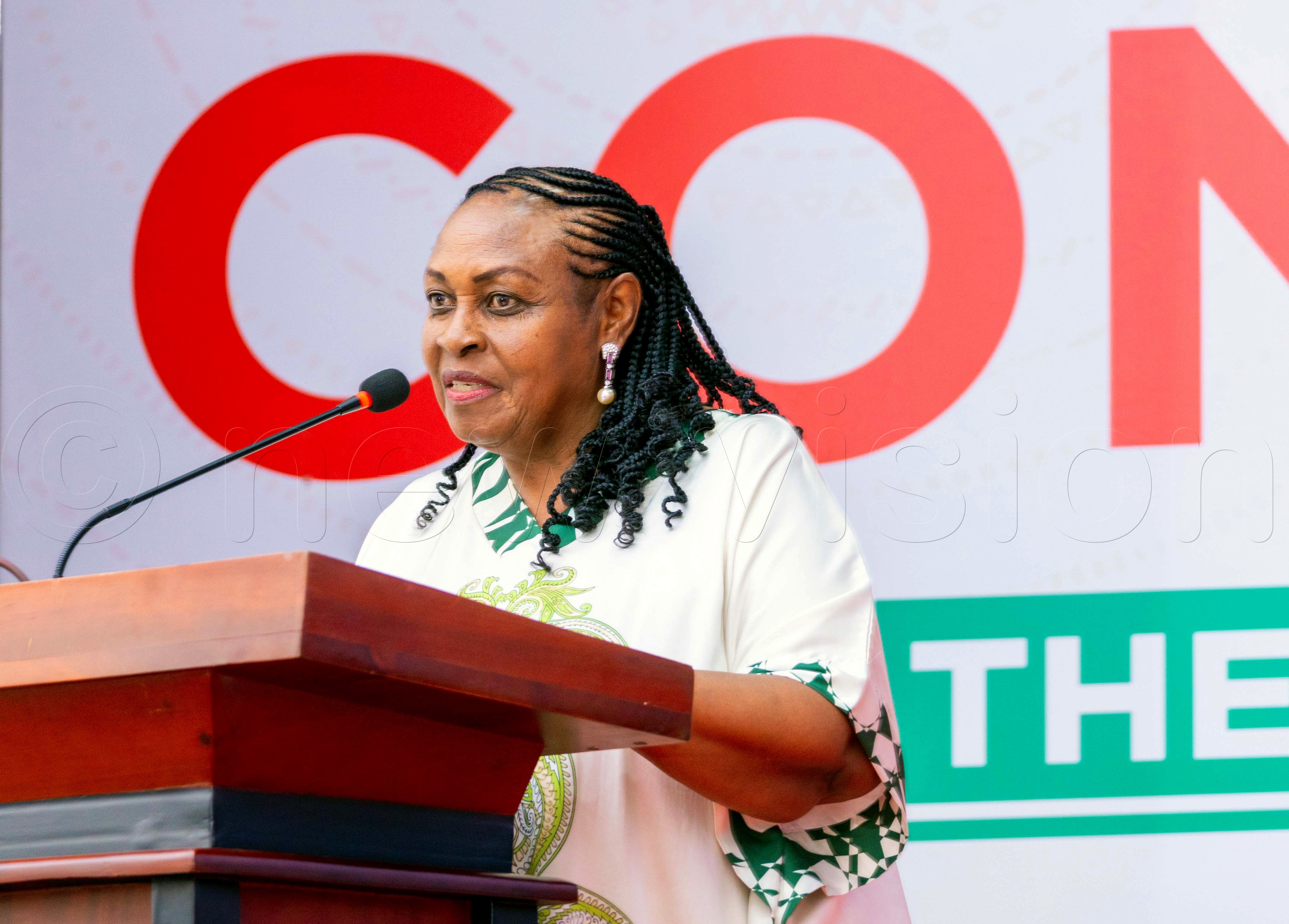 Hope Mwesige speaking to guests, participants and officials from Makerere University during the World Philosophy Day celebrations held at Makerere University Main Hall. (Photo by John Odyek)
