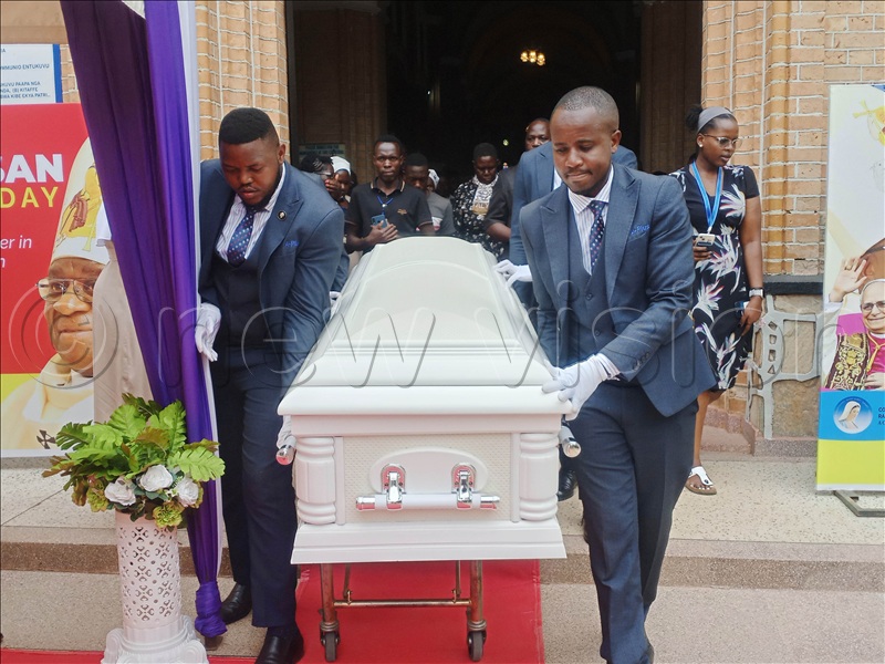 Pallbearers carrying the Bishop’s casket from Lubaga Cathedral on Friday October 23, 2025.