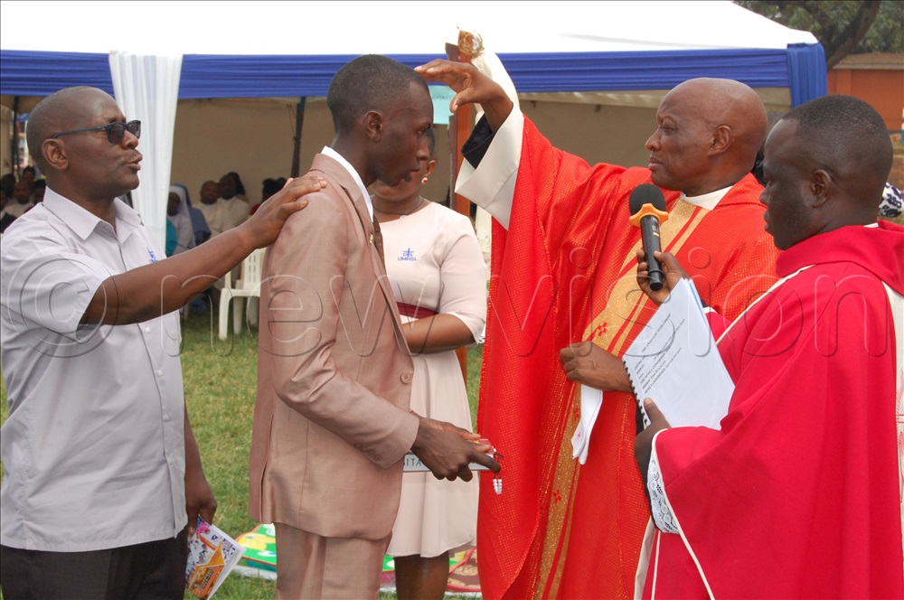 Fr. Pius Male confirming one of the students.