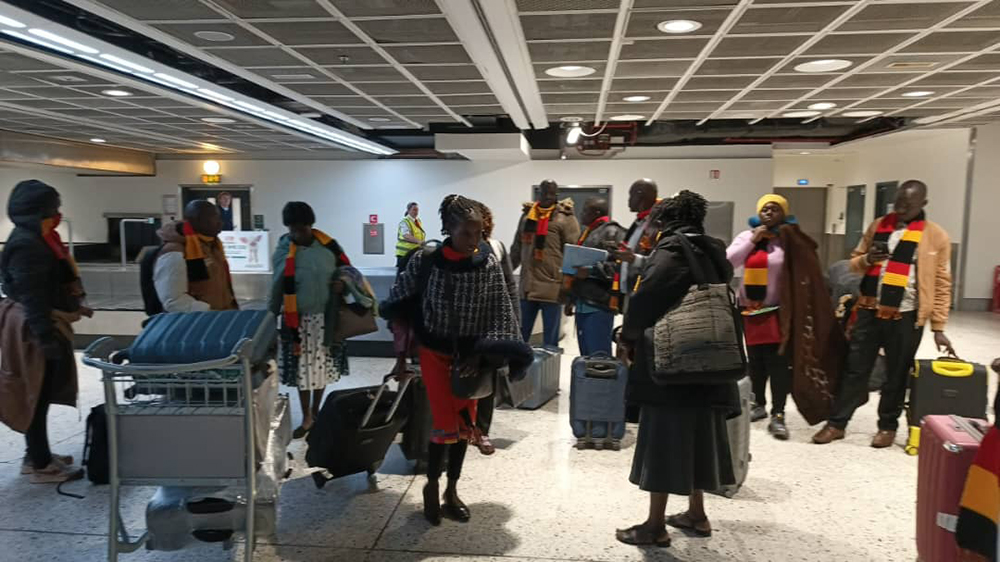 Teachers at the baggage claim on arrival at Dublin International Airport. (Courtesy)