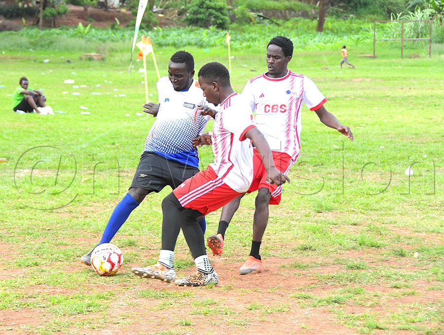 CHOMA and KBC players vie for the ball in the final of the 2025 UJA Media football Gala at Kitante May 4. Photo: Silvano Kibuuka