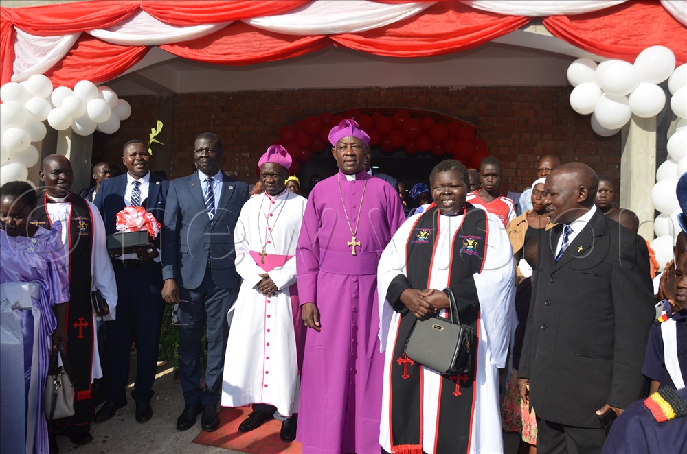 The Archbishop of the Church of Uganda, Most Rev. Dr Stephen Samuel Kaziimba Mugalu, joined by the Bishop of Andaku and other clergy, in front of Christ Church Ediofe after being commissioned