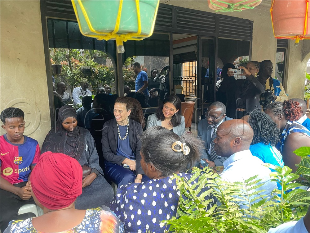 Urban refugees interacting with UN officials. 