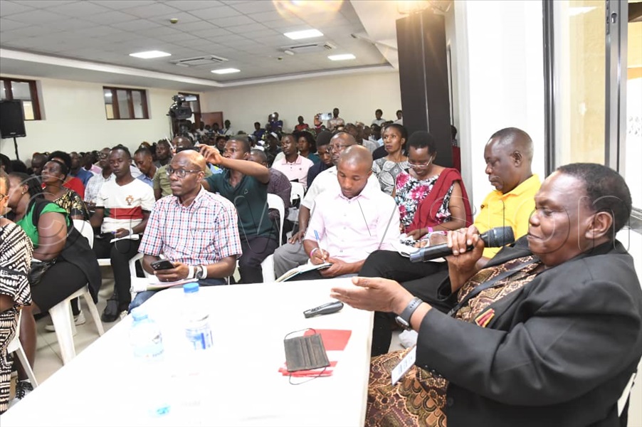 Dr. Jolly Kabirizi, Best Farmer 2020 and animal scientist making a presentation during a dairy cattle zero grazing training session.