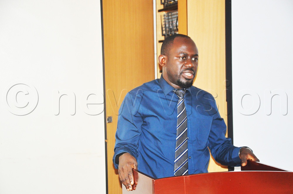 Babyenda discussing the plans of the study during an inception meeting for the study held at the College of Business and Management Studies (COBAMS), Makerere University, Kampala. (Photo by John Odyek)