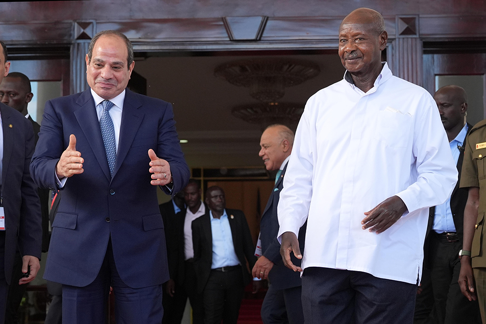 President Museveni shares a light moment with Egyptian President Abdel Fattah El Sisi. (PPU)