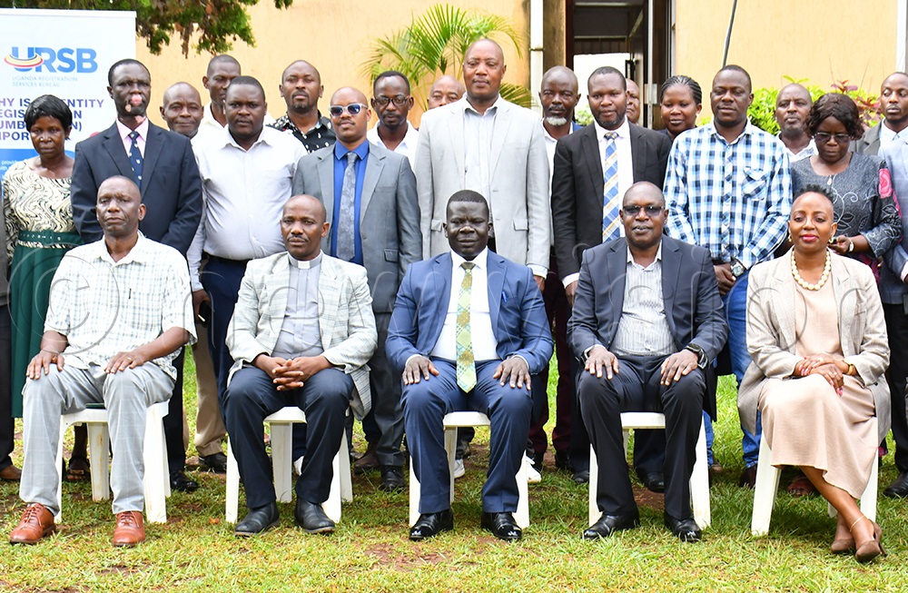 Busoga Kingdom's minister of general duties Edward Munaaba (seated left), Jinja RCC Salim Komakech (seated middle), Ambrose Ekaju (seated 2nd right) the Commissioner in charge of Finance and Administration at URSB and Caroline Egesa (seated Right) the Commissioner Registration Services in charge of Insolvency and Receivership at URSB, in a group photograph with some of the stakeholders after the NIR stakeholders&rsquo; engagement. (Photo by Donald Kiirya)
