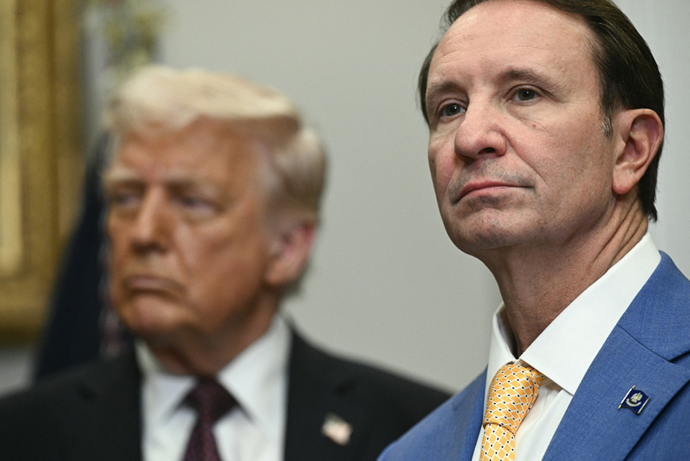 (FILES) US President Donald Trump (L) and then Louisiana Governor Jeff Landry attend an event with Hyundai executives in the Roosevelt Room of the White House in Washington, DC, March 24, 2025. (AFP)