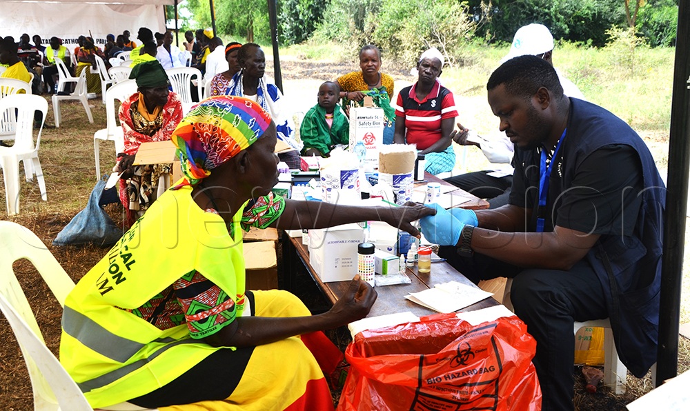 Patients getting free treatment at a medical camp at Matany Church on Monday. Credit: Delux Emmy Alomu)