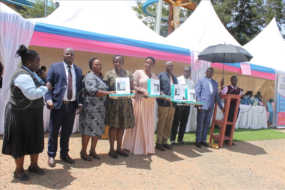 Outstanding members of Rushere SACCO received awards at the 24th Annual General Meeting held on Saturday. 
