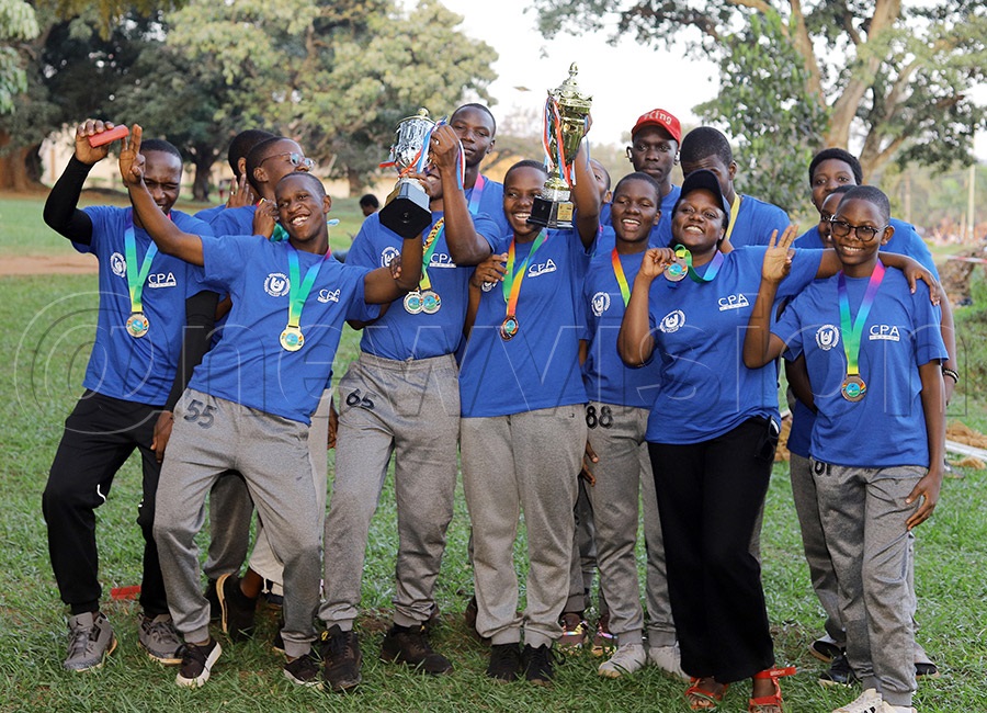 Mengo Secondary School celebrate winning the boys' category and finishing third in the girls' category at the ICPAU Junior Championship in Kyambogo. &mdash; Photo by Johnson Were
